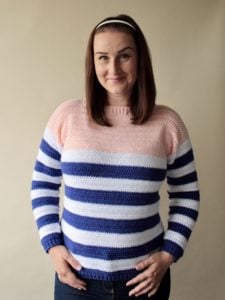 crochet sweater pattern being worn by model