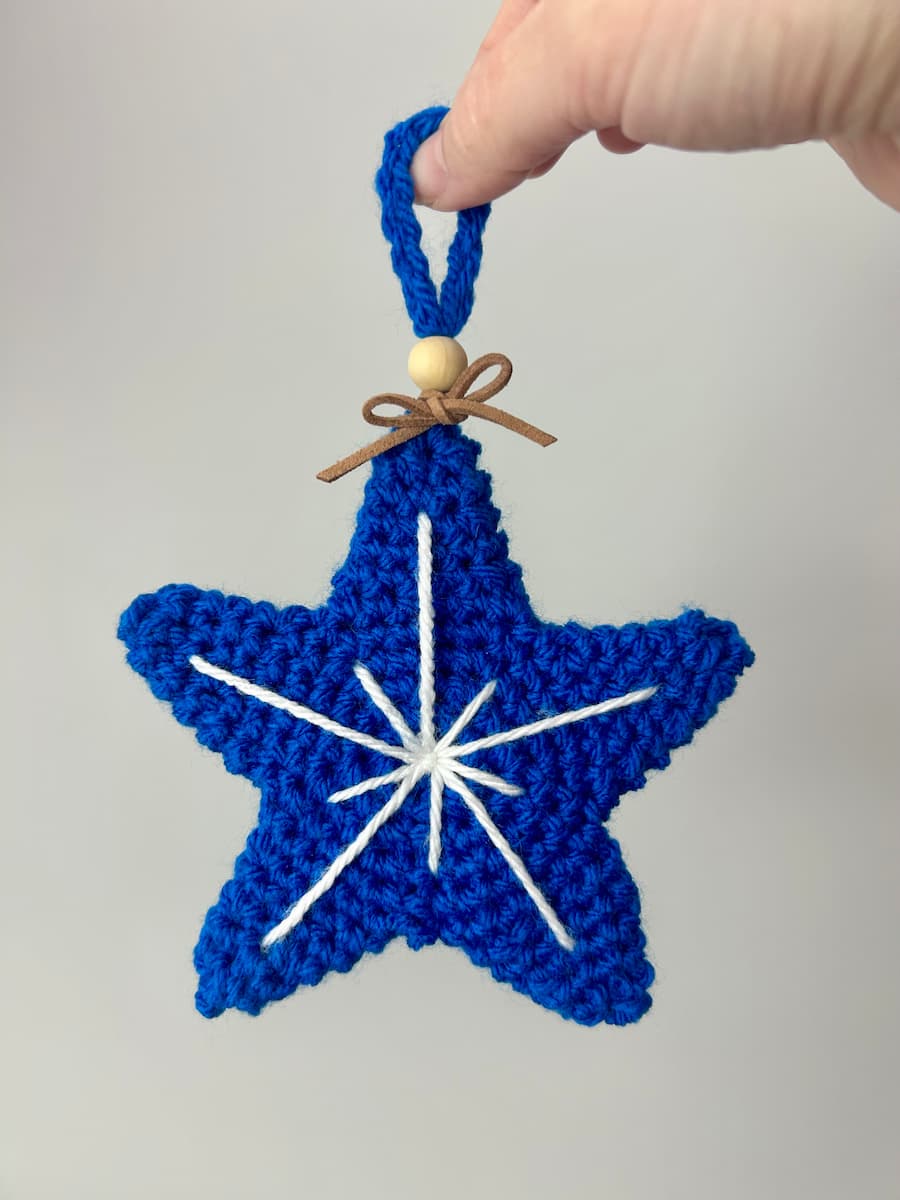 dark blue crochet star hanging decoration